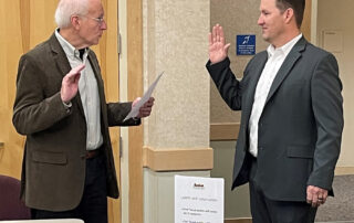 Former Mayor Woerner swearing in Jody Amos as LVCC Chair